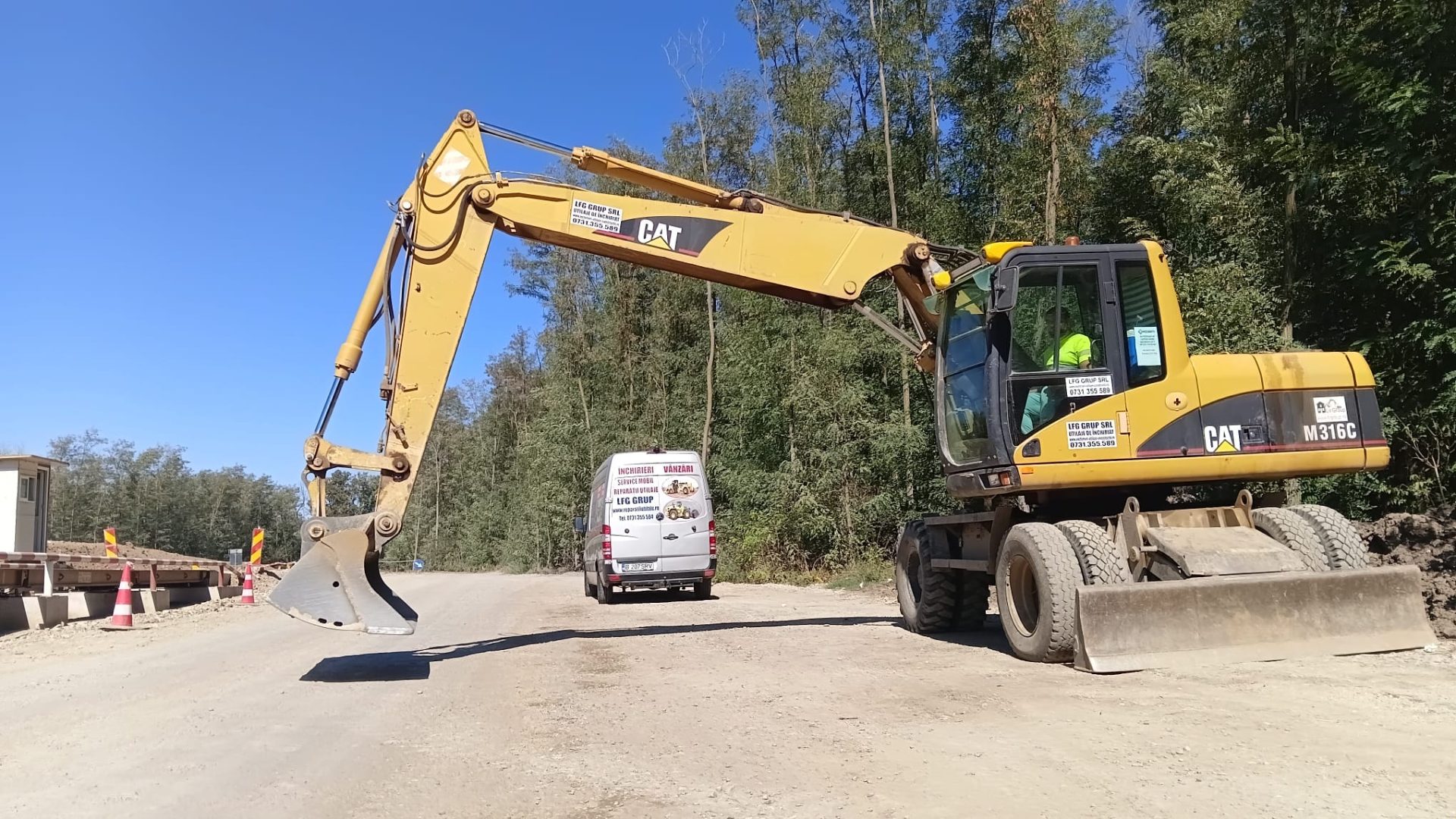 CAT M316C excavator roti lucrari drum